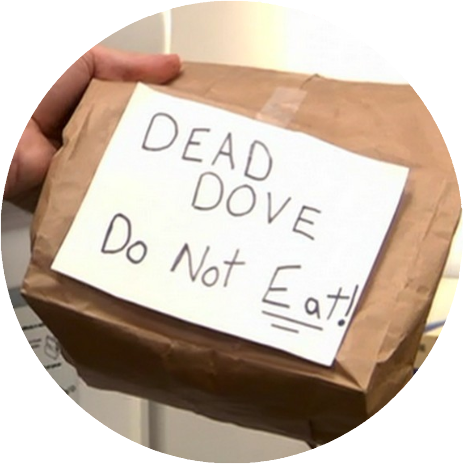 Circular badge with the words 'dead dove do not eat' written on a paper bag